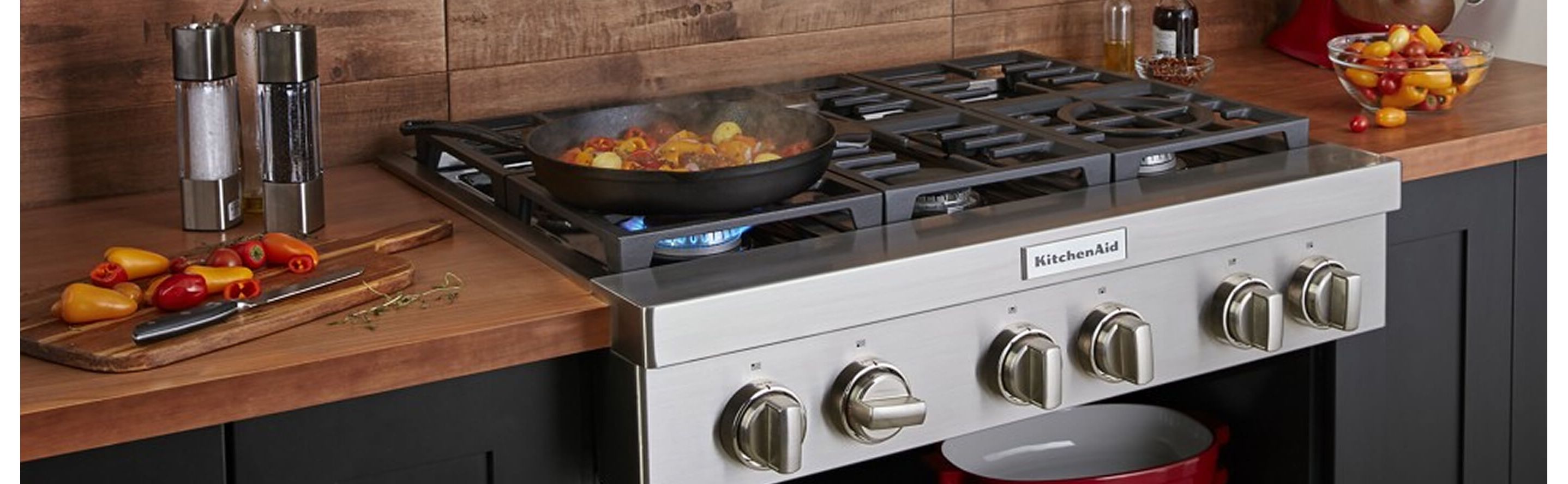 A dish cooking on a KitchenAid® cooktop