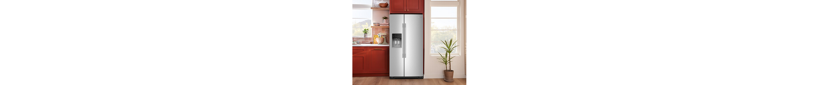 A counter-depth refrigerator built in to brown cabinetry