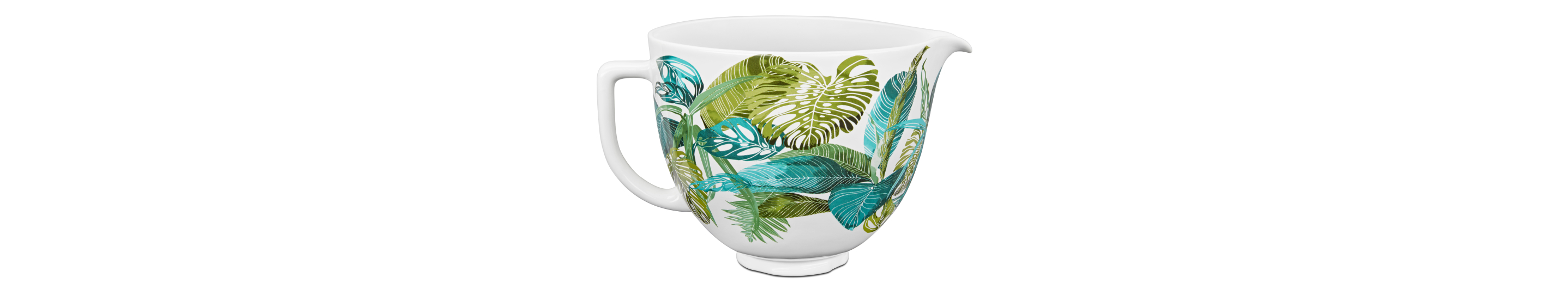 A mixing bowl with a green and blue leaf design.