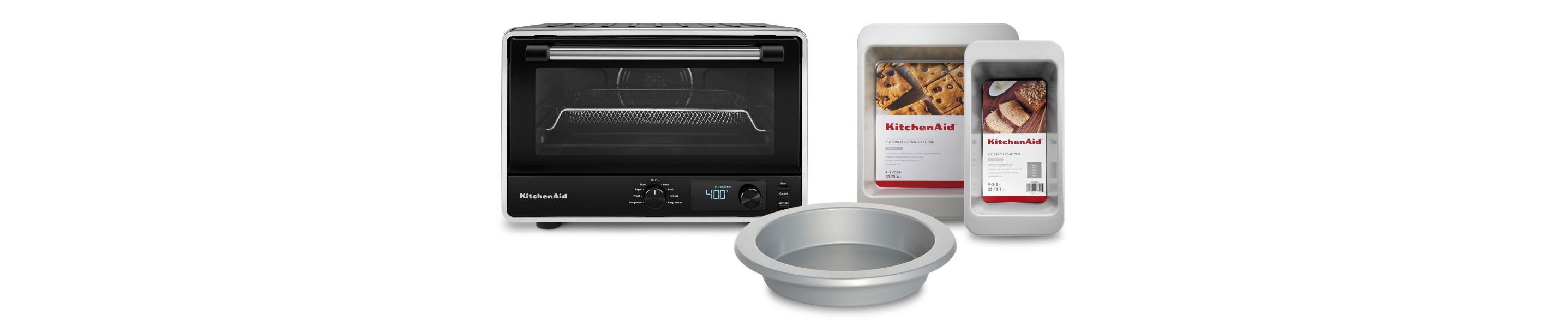 A KitchenAid® countertop oven and bakeware set.