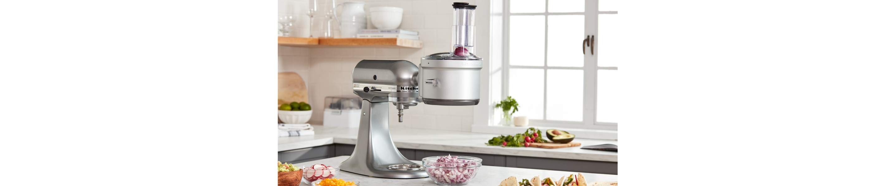 A dicing attachment and bowl of diced red onions.