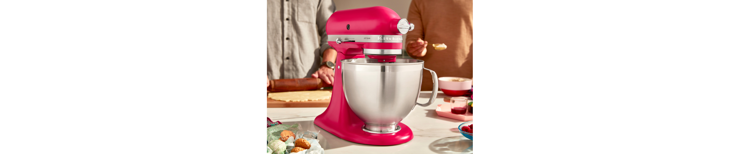 A red KitchenAid® stand mixer on a countertop