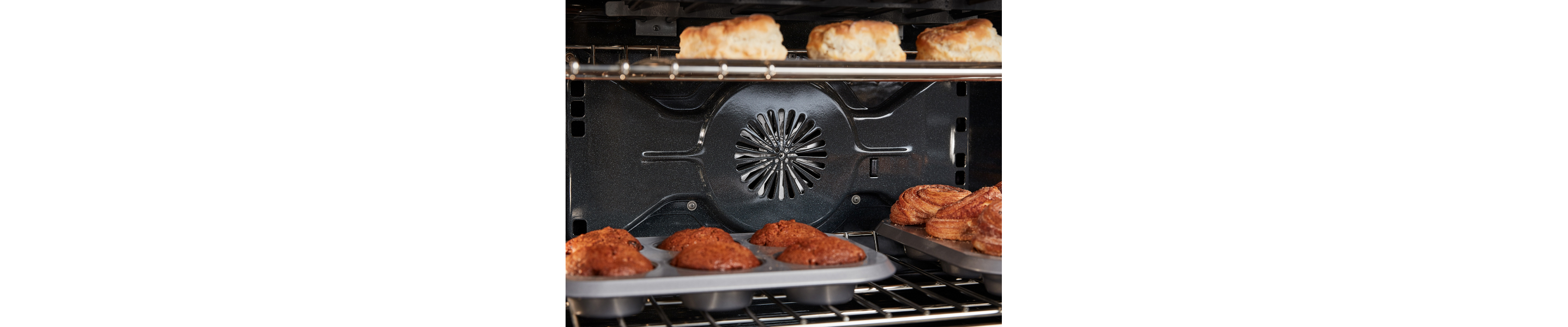 A convection fan pushing air to bake food 