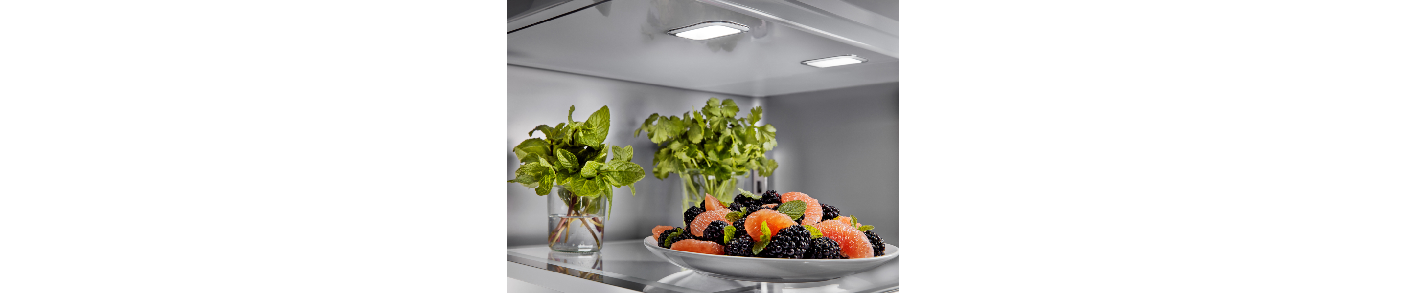 A closeup of an interior shelf of a KitchenAid® refrigerator.