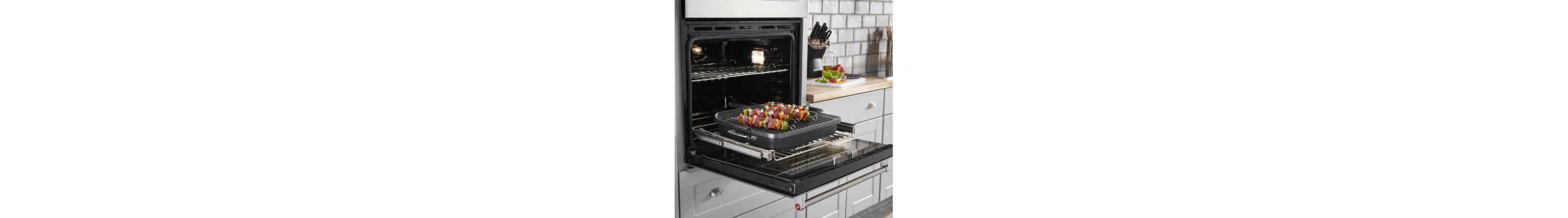 Kabobs on a grill pan in a KitchenAid® oven