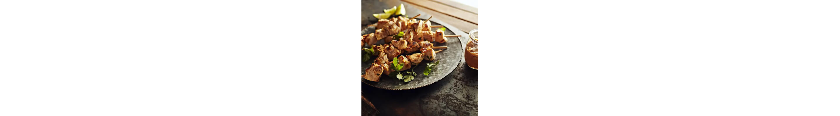 Thai chicken skewers on a plate
