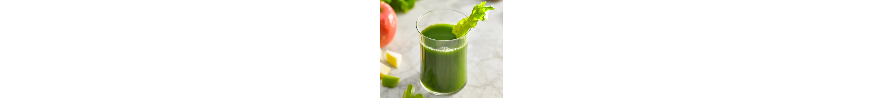 Glass of green juice from Yummly recipe with stalk of celery