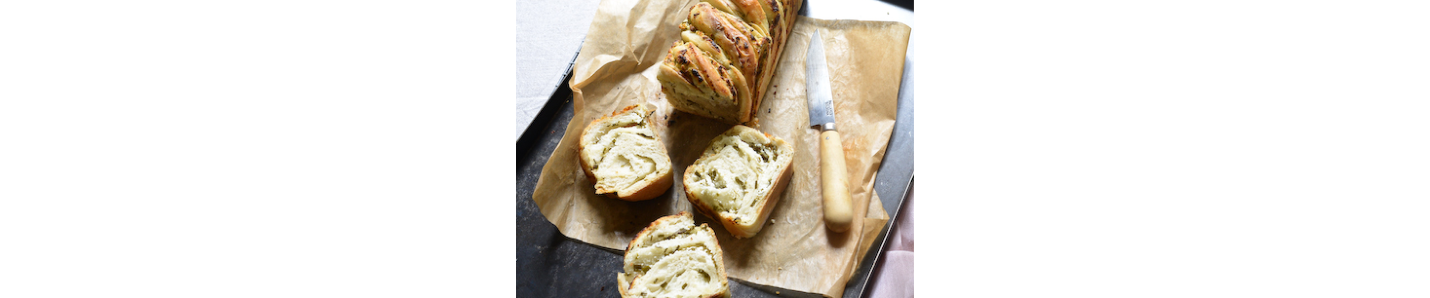 Sliced babka on parchment paper 