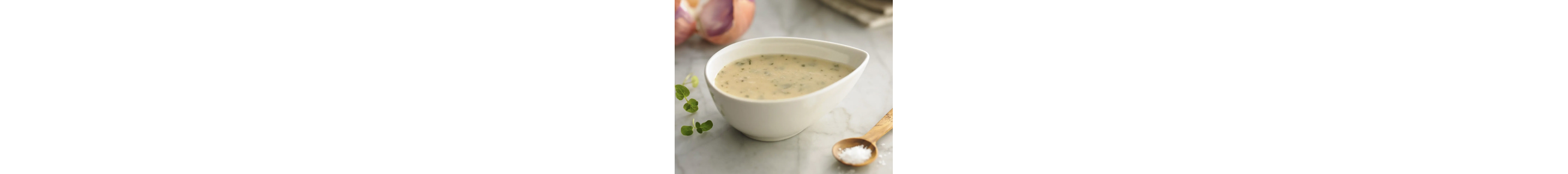 A dish of homemade vinaigrette dressing.