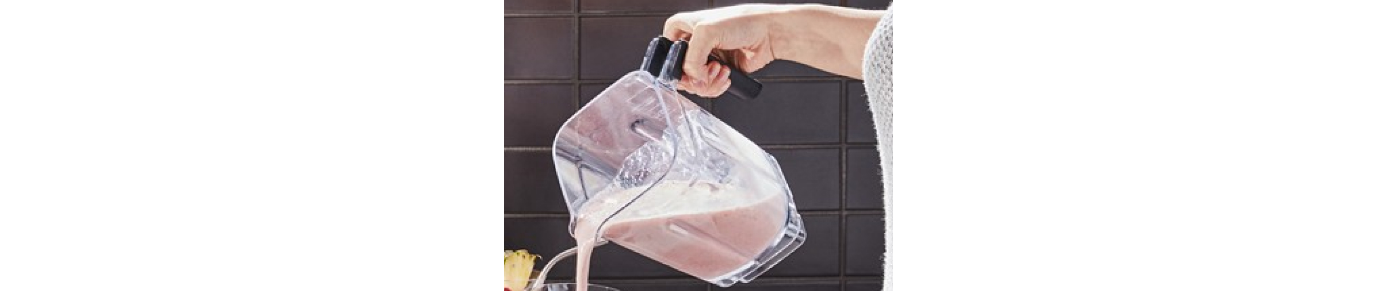 Frosé being poured from a KitchenAid® blender
