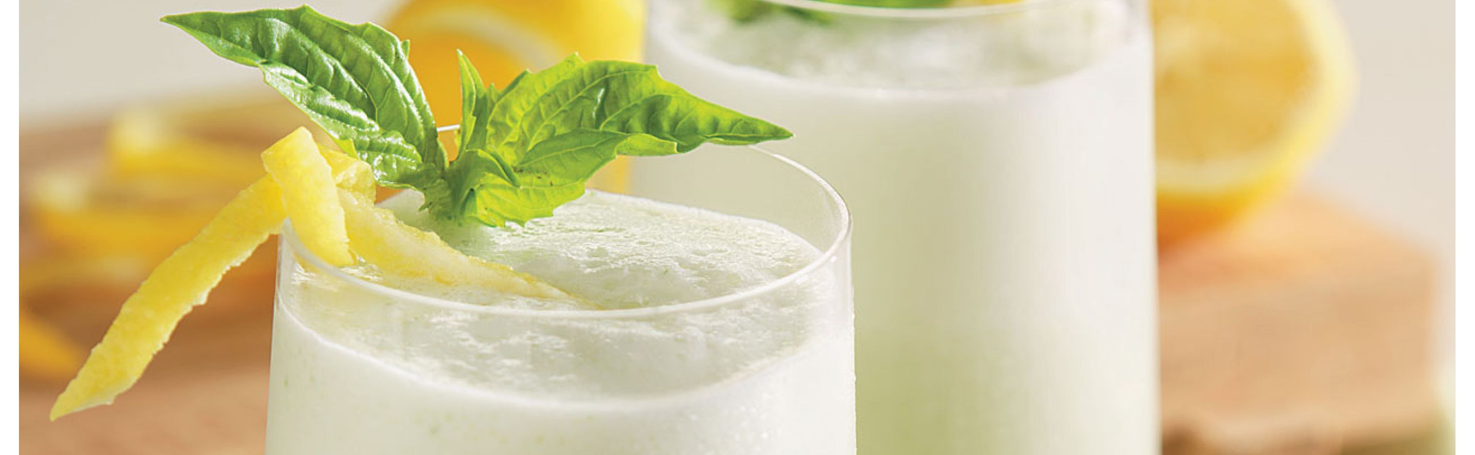 Frozen lemonade with candied citrus and fresh basil