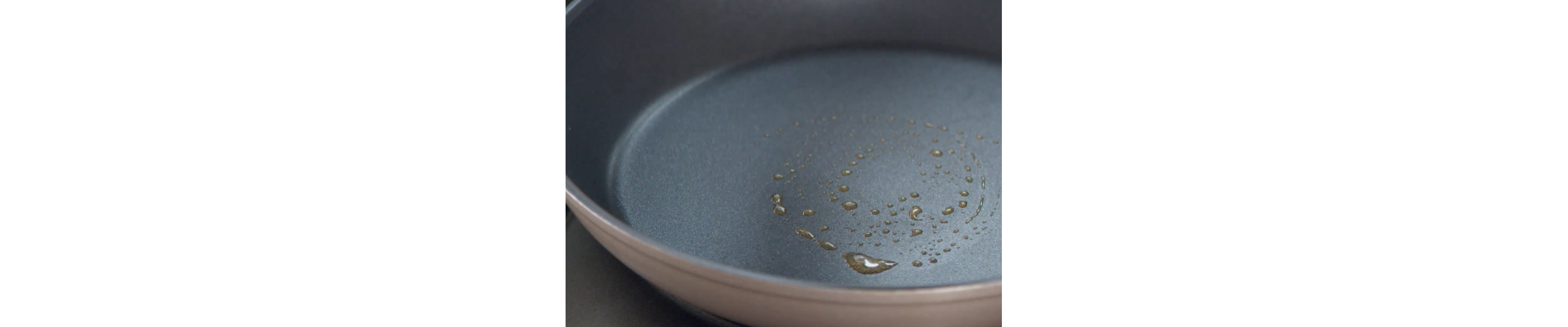 Skillet sprayed with cooking oil and heating