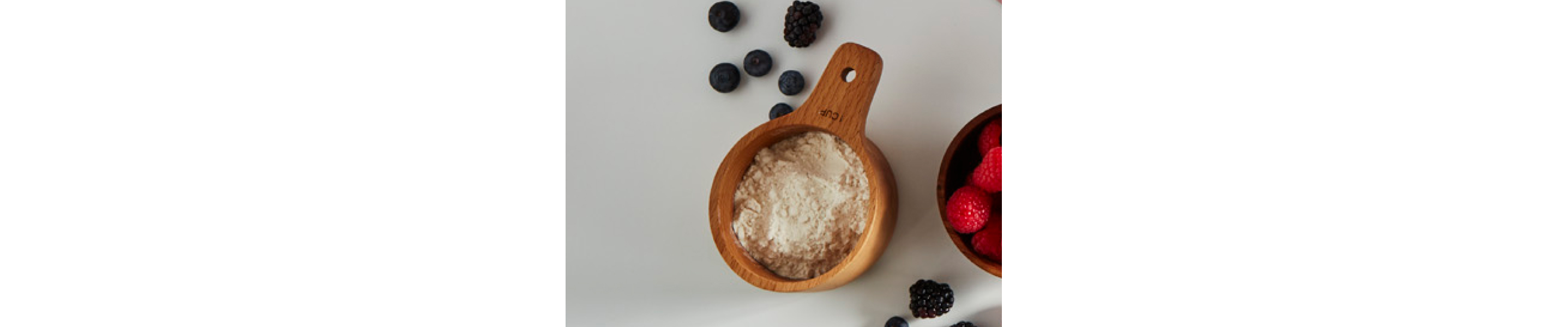 Protein powder in a measuring cup