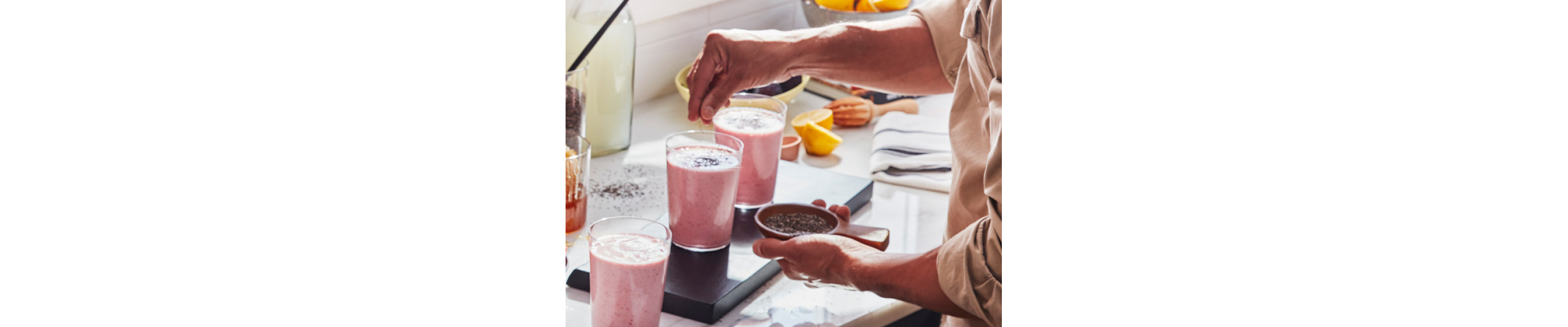 Person sprinkling seeds on a shake