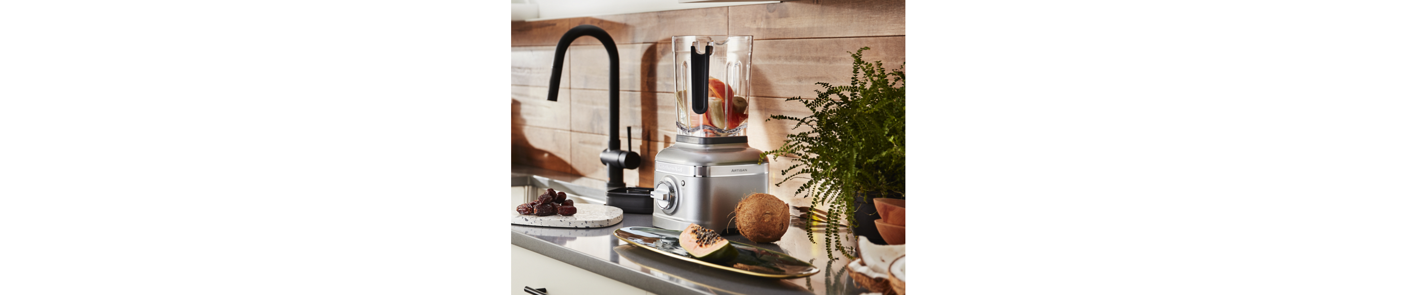 Fruit in a silver KitchenAid® blender