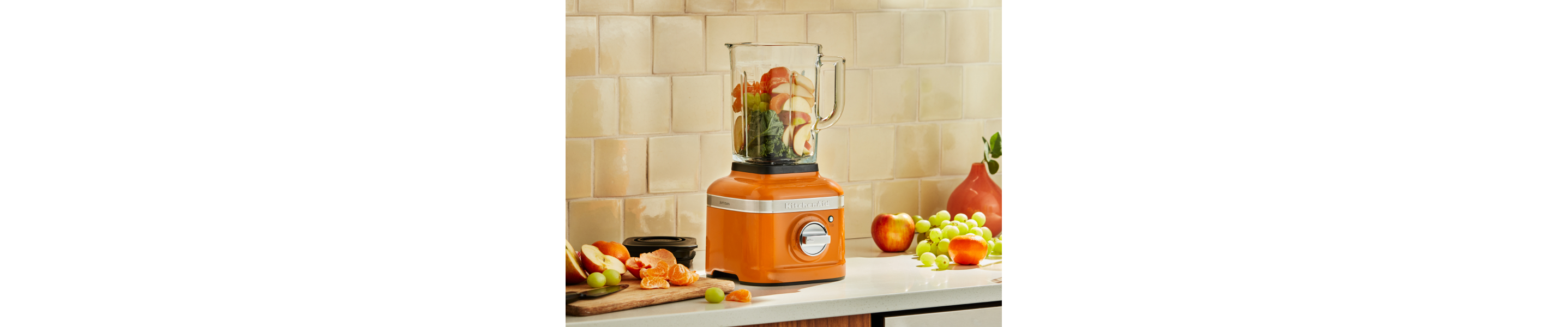 Fruit in an orange KitchenAid® blender