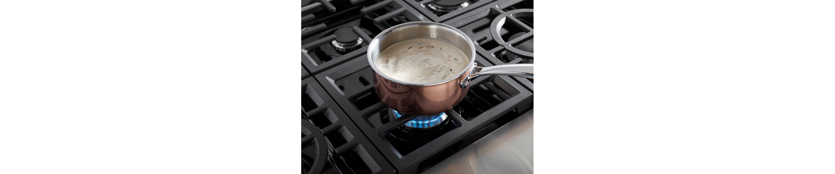Rice pudding boiling on a burner