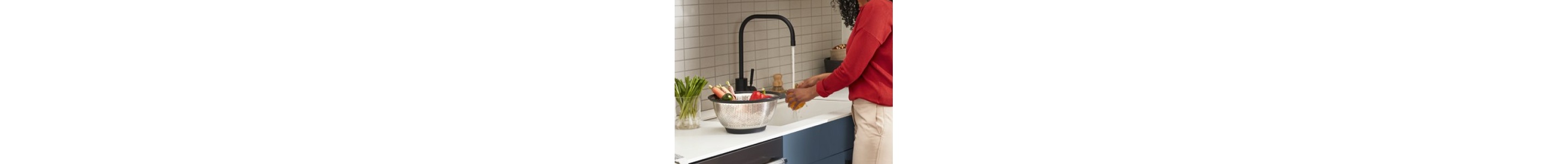 Person washing vegetable