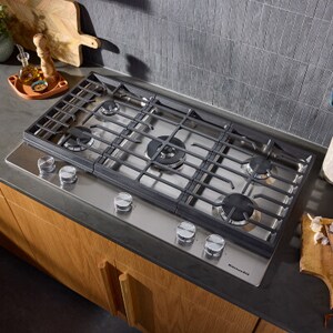 An overhead view of a gas stovetop