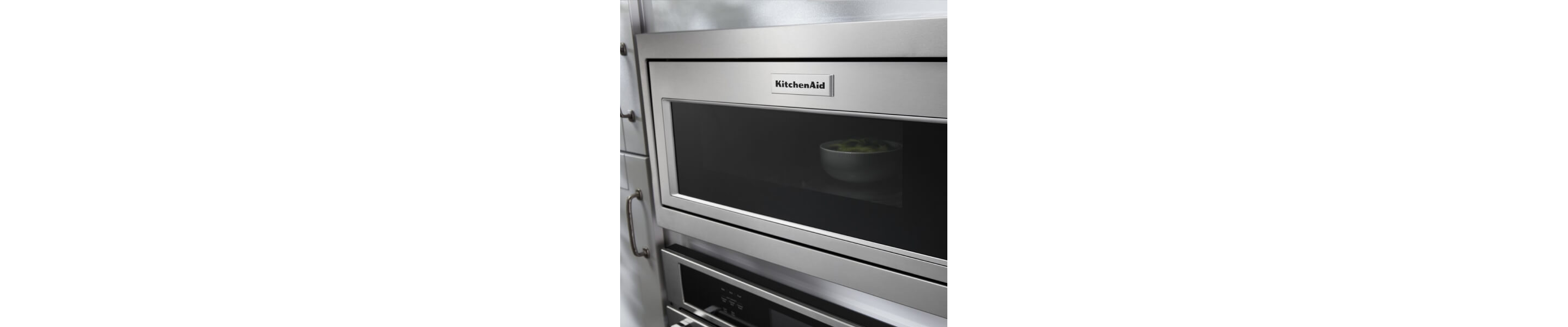 Stainless steel, built-in KitchenAid® microwave with bowl inside