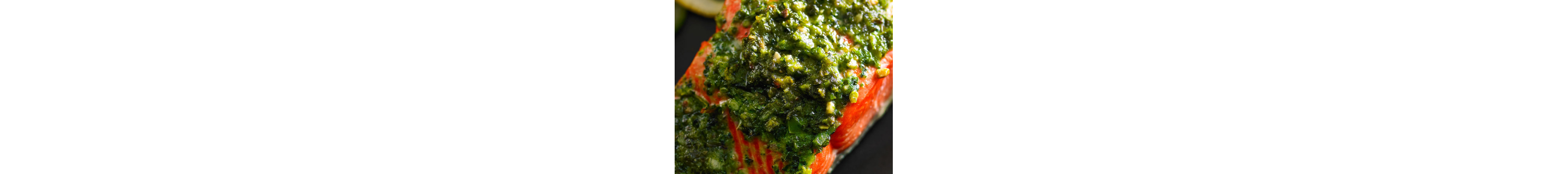 Salmon with sauce on it