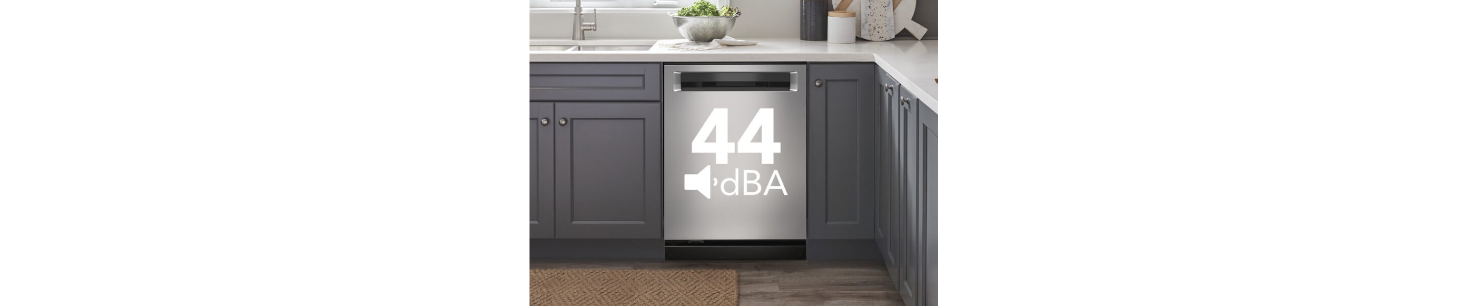 Stainless steel dishwasher with 44 dBA text on the exterior