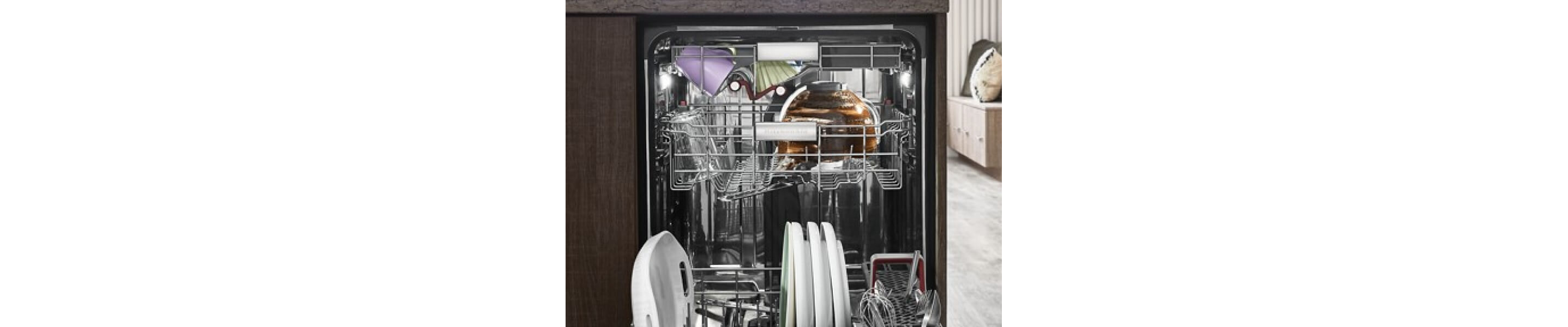 A fully loaded third rack dishwasher