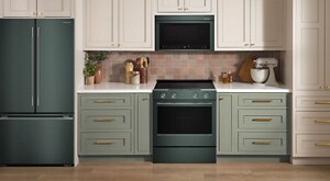 KitchenAid® Juniper Appliance Suite in sage green and cream cabinetry