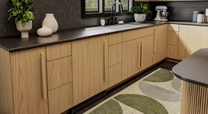 Natural wood-look lower cabinetry beneath dark countertops