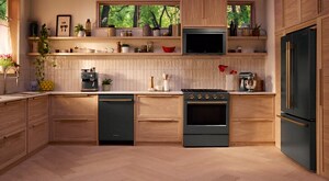 Kitchen with natural wood colors and a KitchenAid® Appliance Suite in Juniper