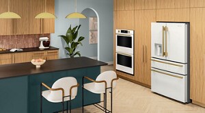 White KitchenAid® Double Wall Oven and French Door Refrigerator in natural wood cabinetry
