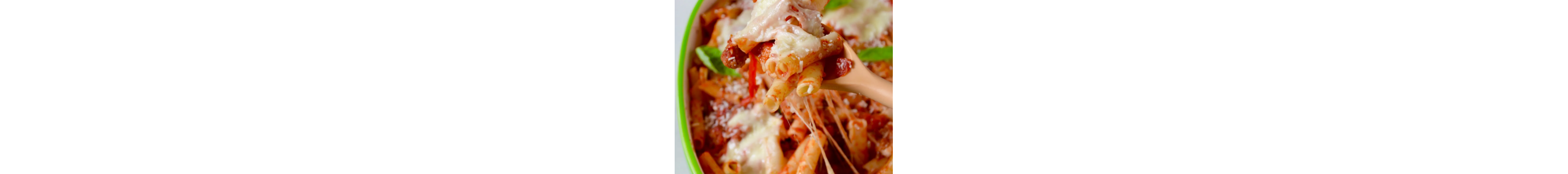 Baked ziti on wooden spoon