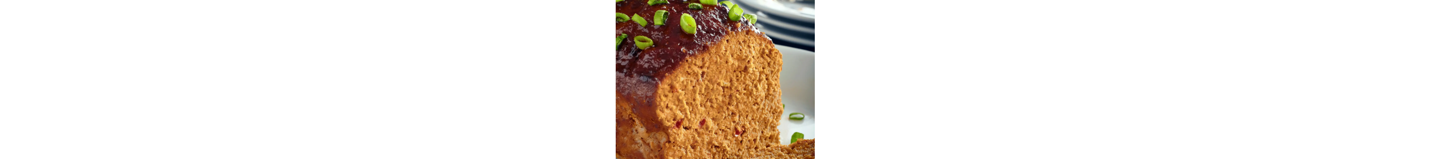 Turkey meatloaf with scallion garnish
