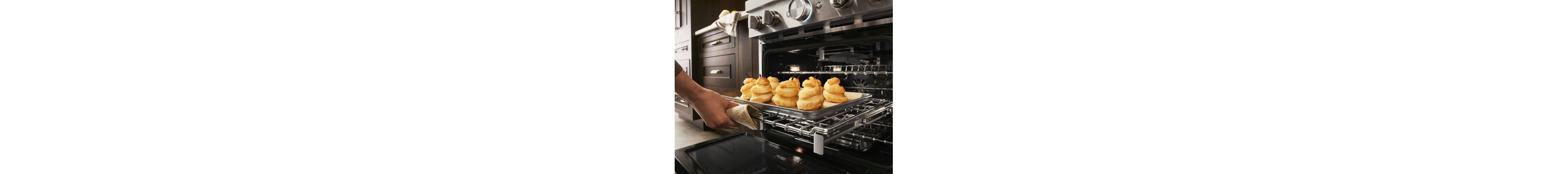 Popovers being removed from oven