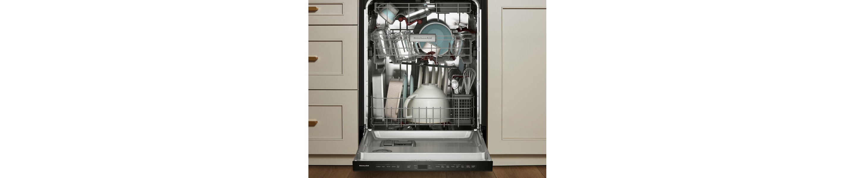 Dishwasher open to reveal dishes inside