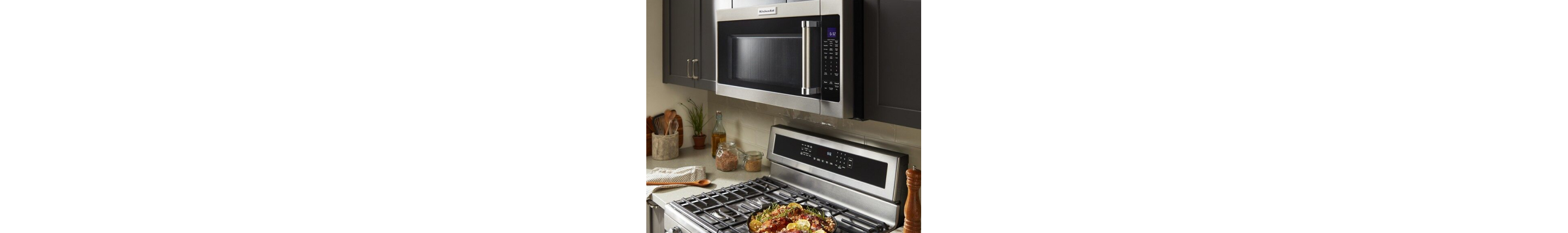 KitchenAid® microwave range hood over a freestanding range