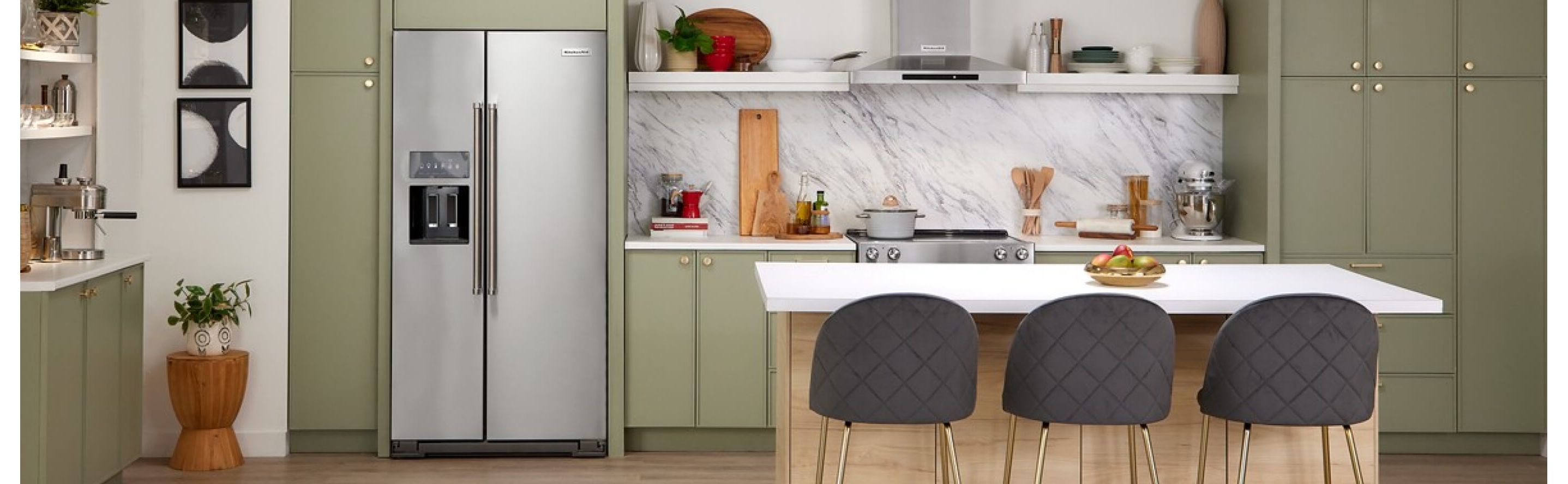 A modern kitchen with a stainless steel side-by-side refrigerator