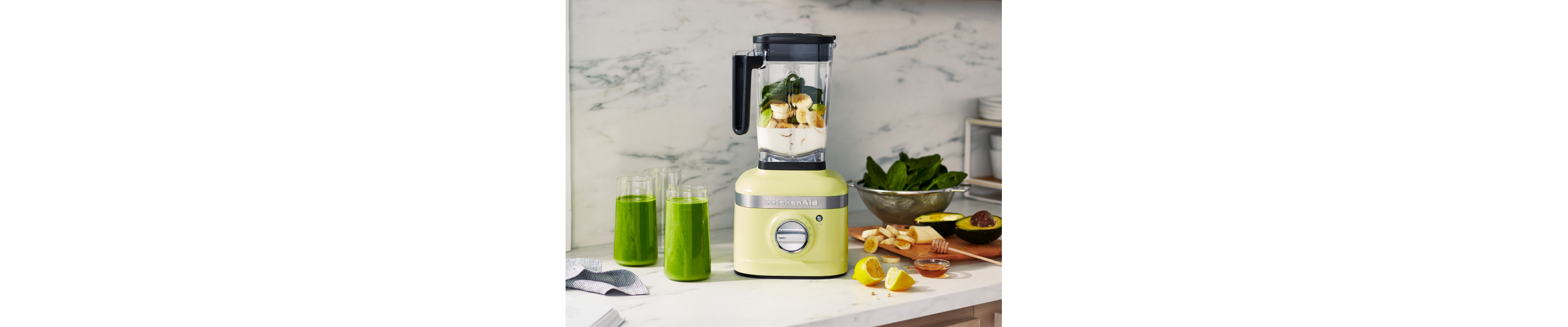 KitchenAid® blender with green smoothie ingredients