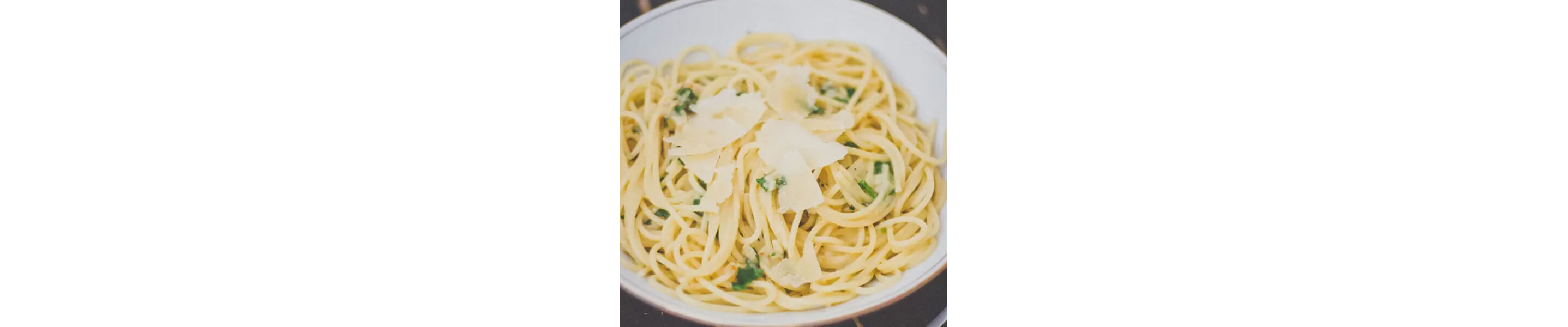 Pasta with slivers of cheese