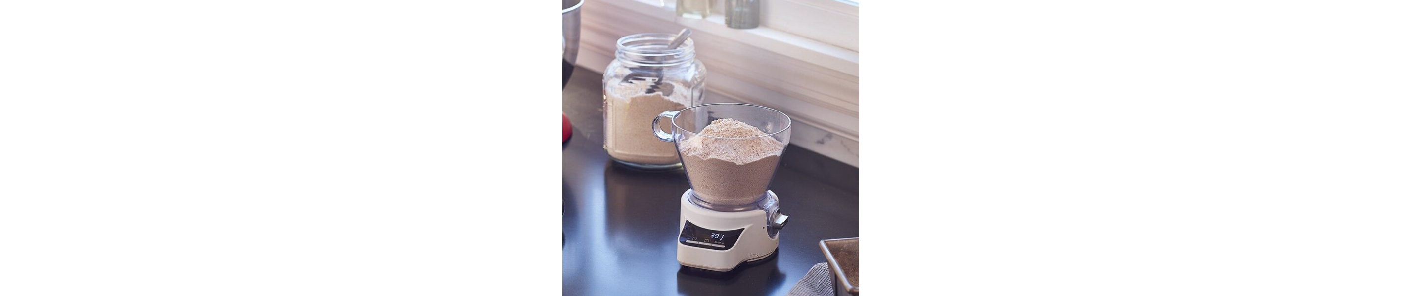 Fine ground grains in the KitchenAid® sifter and scale attachment.