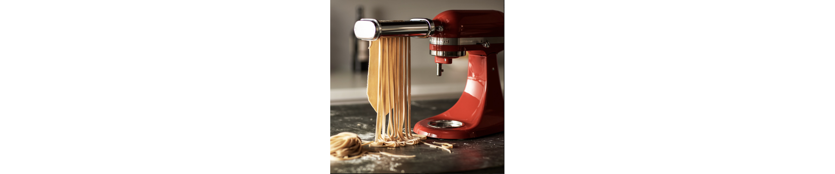 KitchenAid® stand mixer with pasta attachment.