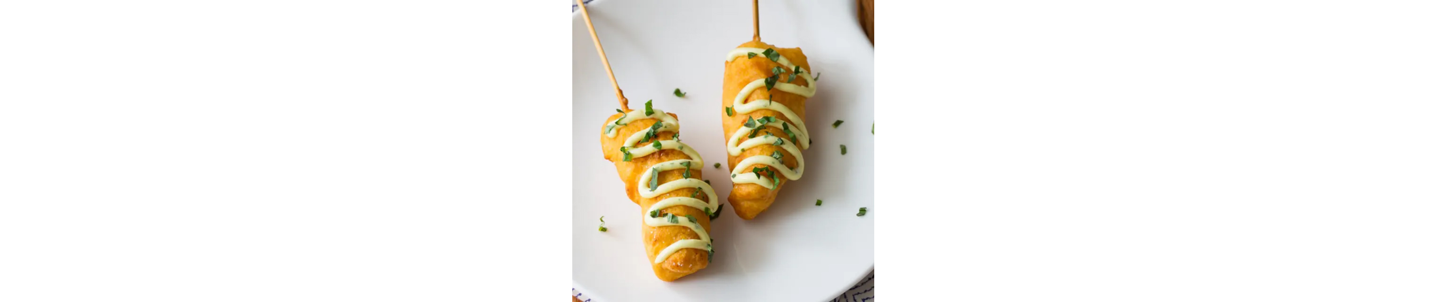 Lobster corn dogs with savory aioli.