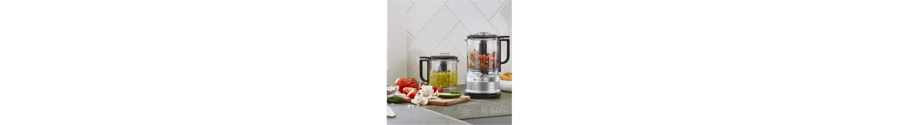 KitchenAid® food processors filled with salsa