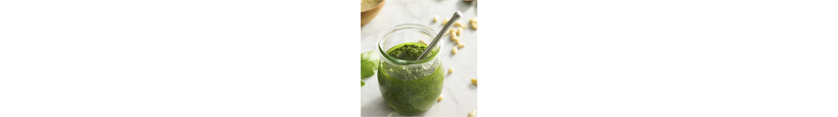 A jar of classic pesto sauce