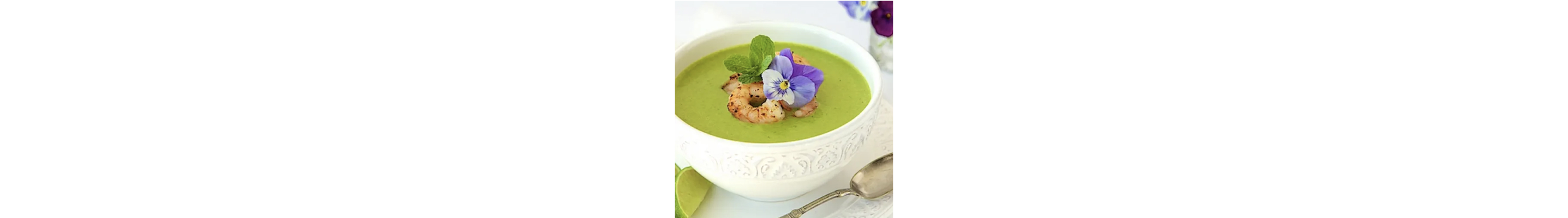 A bowl of asparagus and shrimp coconut curry