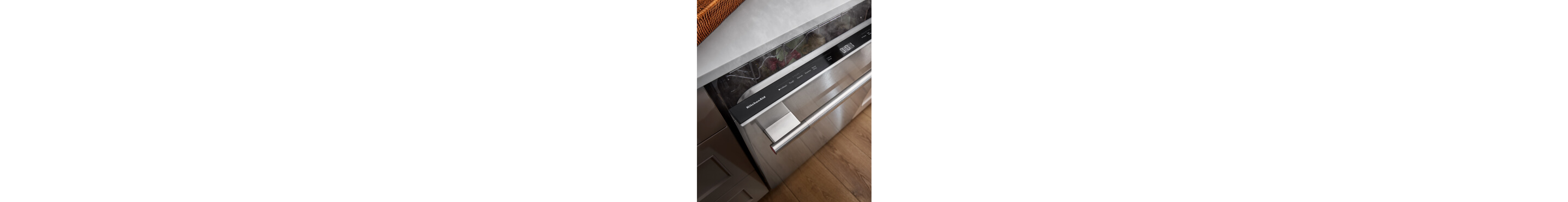 A closeup of the controls on a dishwasher