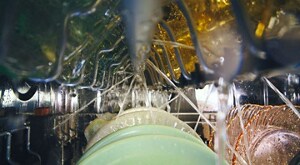 The inside of a running dishwasher