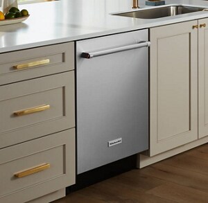 The interior of a kitchen with a KitchenAid® dishwasher