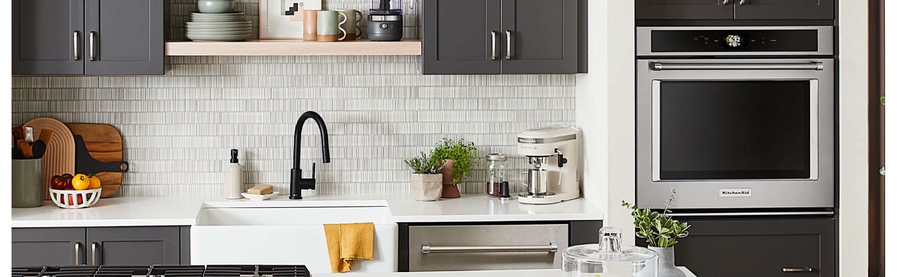 Stainless steel KitchenAid® single wall oven in dark gray cabinetry