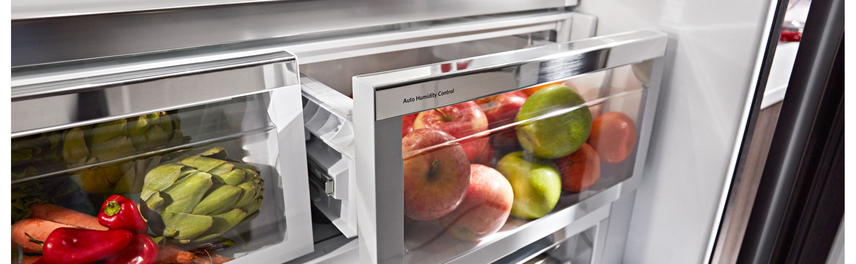 Close-up of fruit and vegetables in a humidity controlled refrigerator drawer